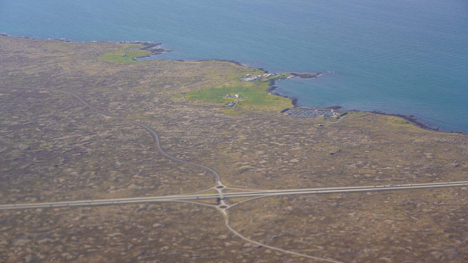 stormy coastal scene over Faxaflói and South Iceland with wind-swept travel disruption