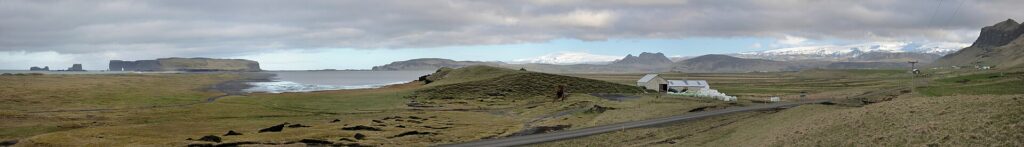 Mýrdalshreppur landscape with Vík village and Katla/Mýrdalsjökull backdrop