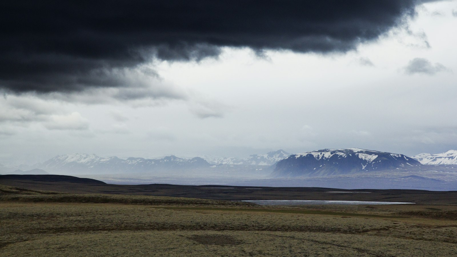 Dark storm clouds over the mountains