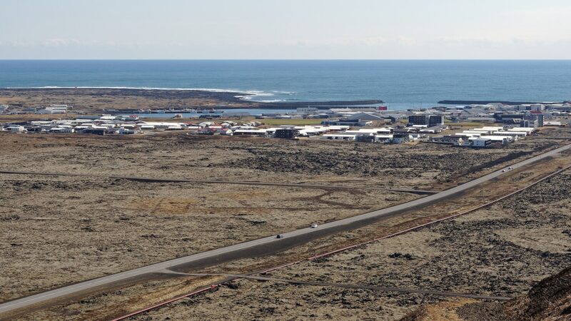 Coastal town and harbour seen from higher ground (Grindavík)