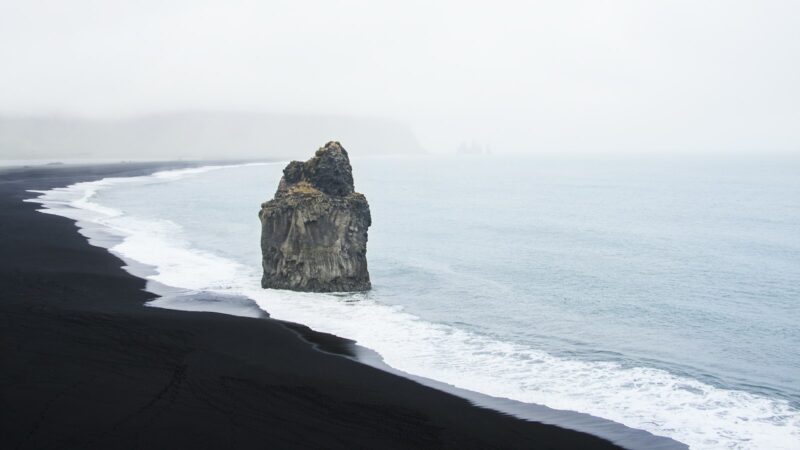 Stones on a black seashore