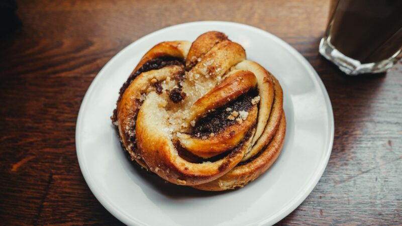 A pastry and a cup of coffee