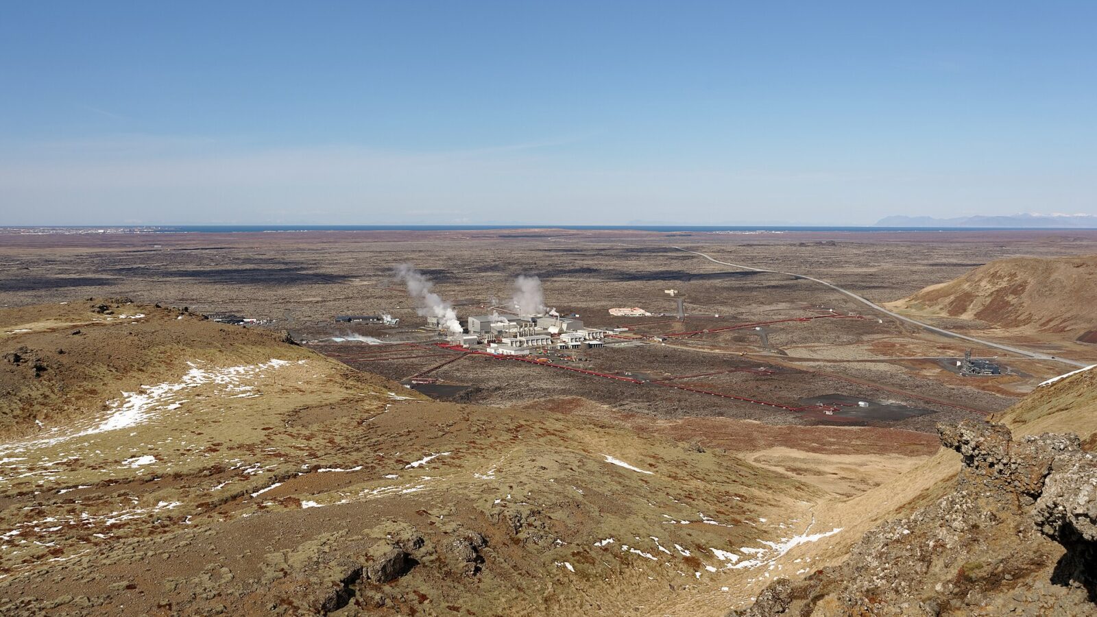 Geothermal power plant in a lava field with steam plumes (Svartsengi)