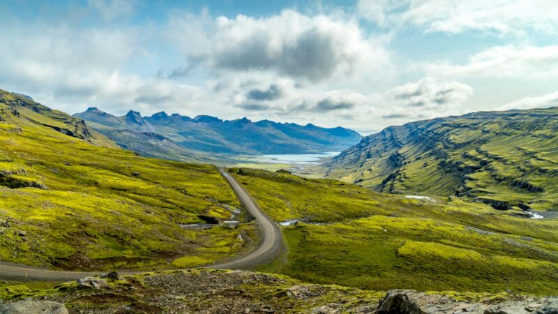 A winding road through a green valley