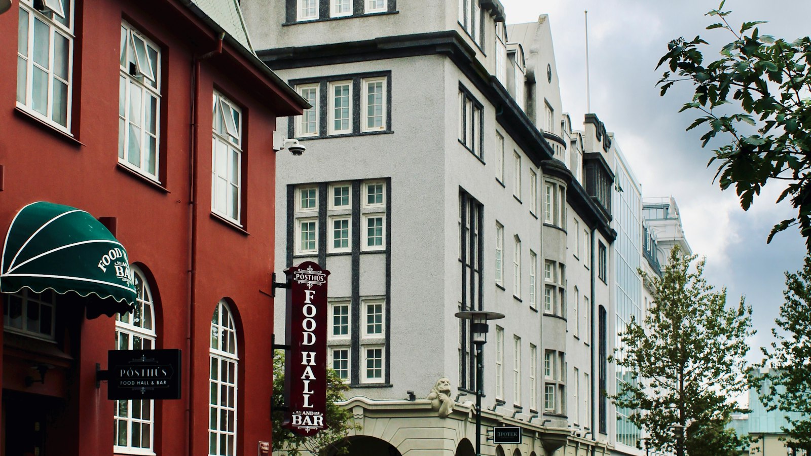 Street with colourful shopfronts and awnings