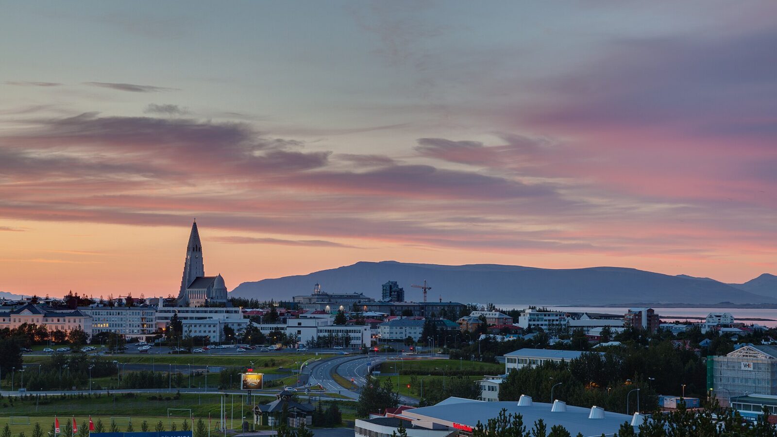 City skyline with church tower and colourful dusk sky (Reykjavík)