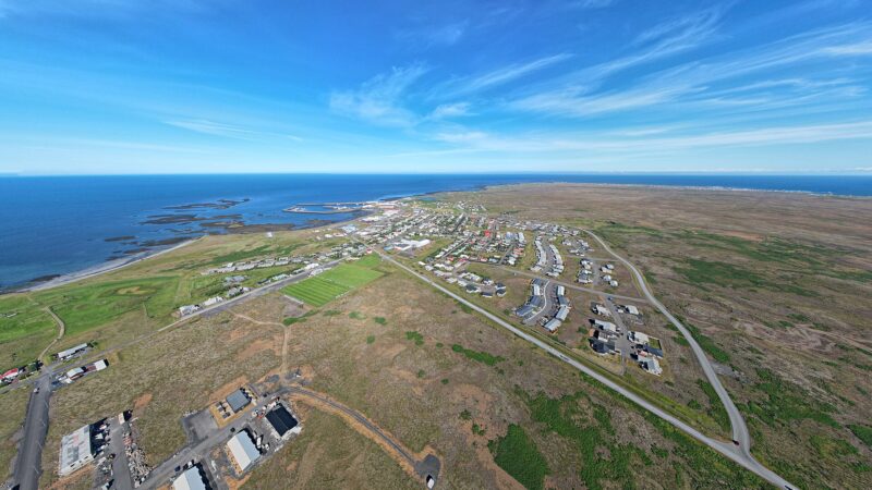 Aerial view of the coastal town, harbour and surrounding sea (Sandgerði)