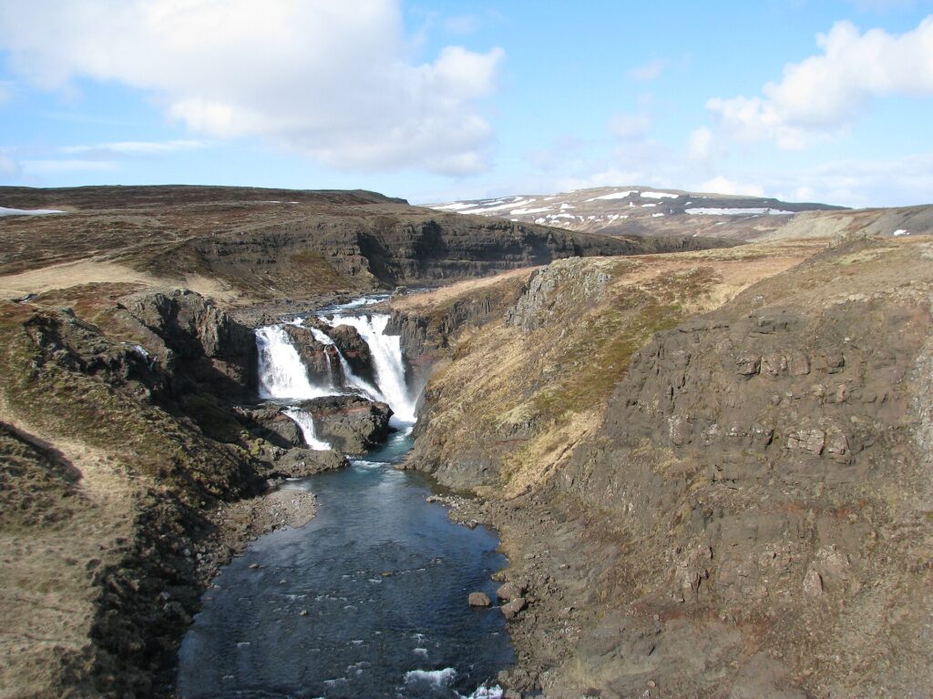 Waterfall flowing through a rocky river canyon (Eyja- og Miklaholtshreppur)