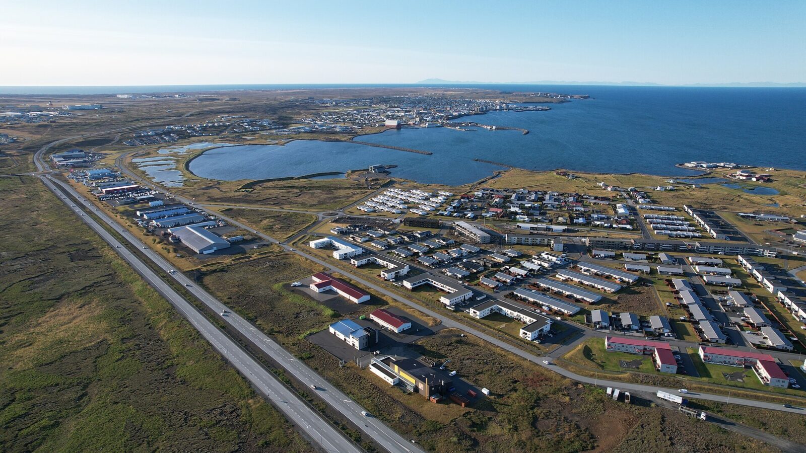 Panoramic aerial view of the town, harbour and surrounding coast (Njarðvík)