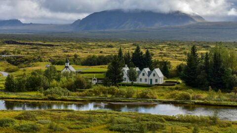Þingvellir church and the old farmhouse by the lake
