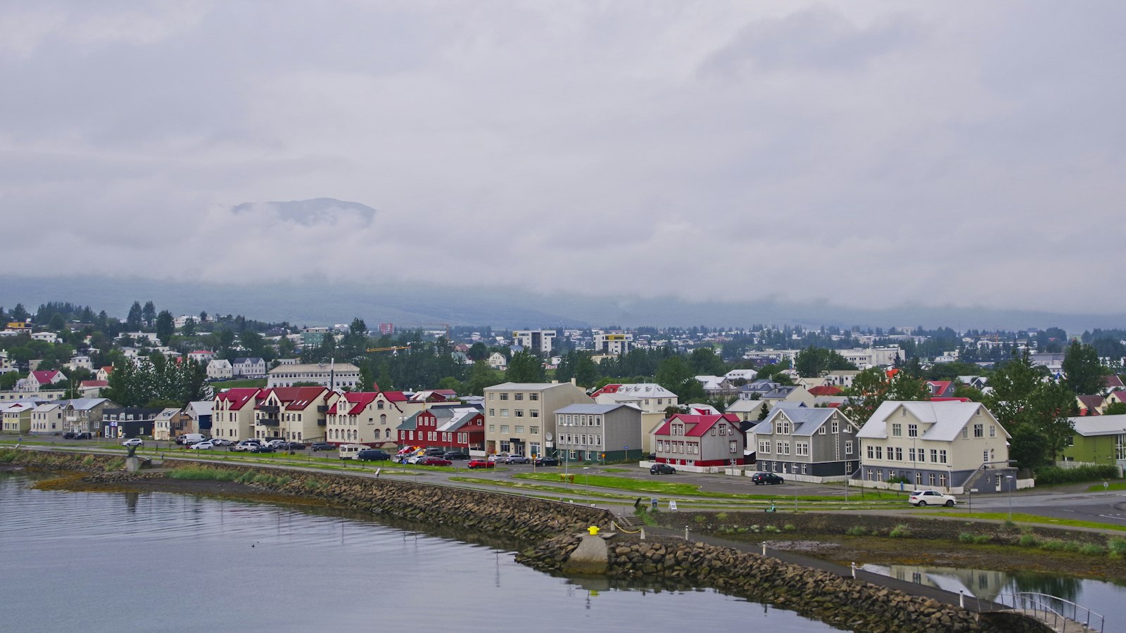 Akureyri town and waterfront under a grey sky