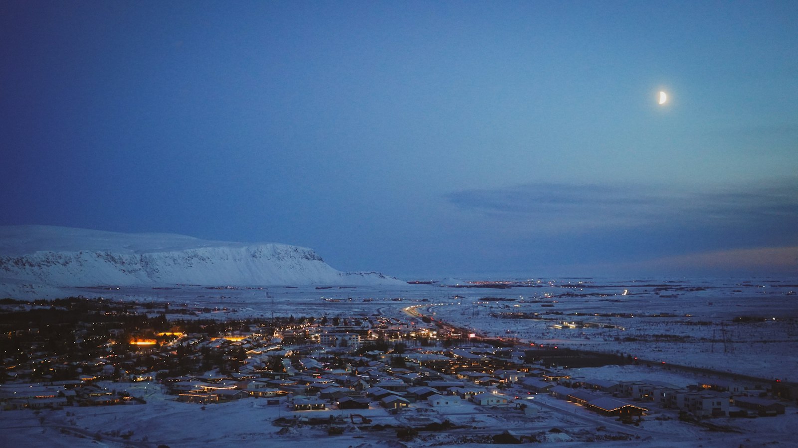 Hveragerði at dusk seen from the hills