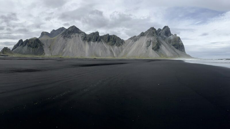 Flat plain with mountains behind