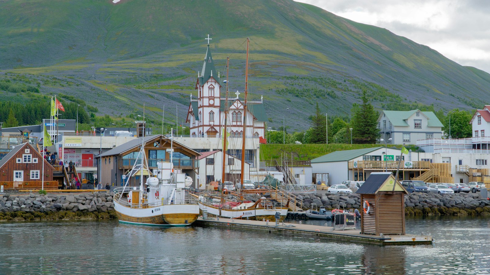 Húsavík harbour with its wooden church