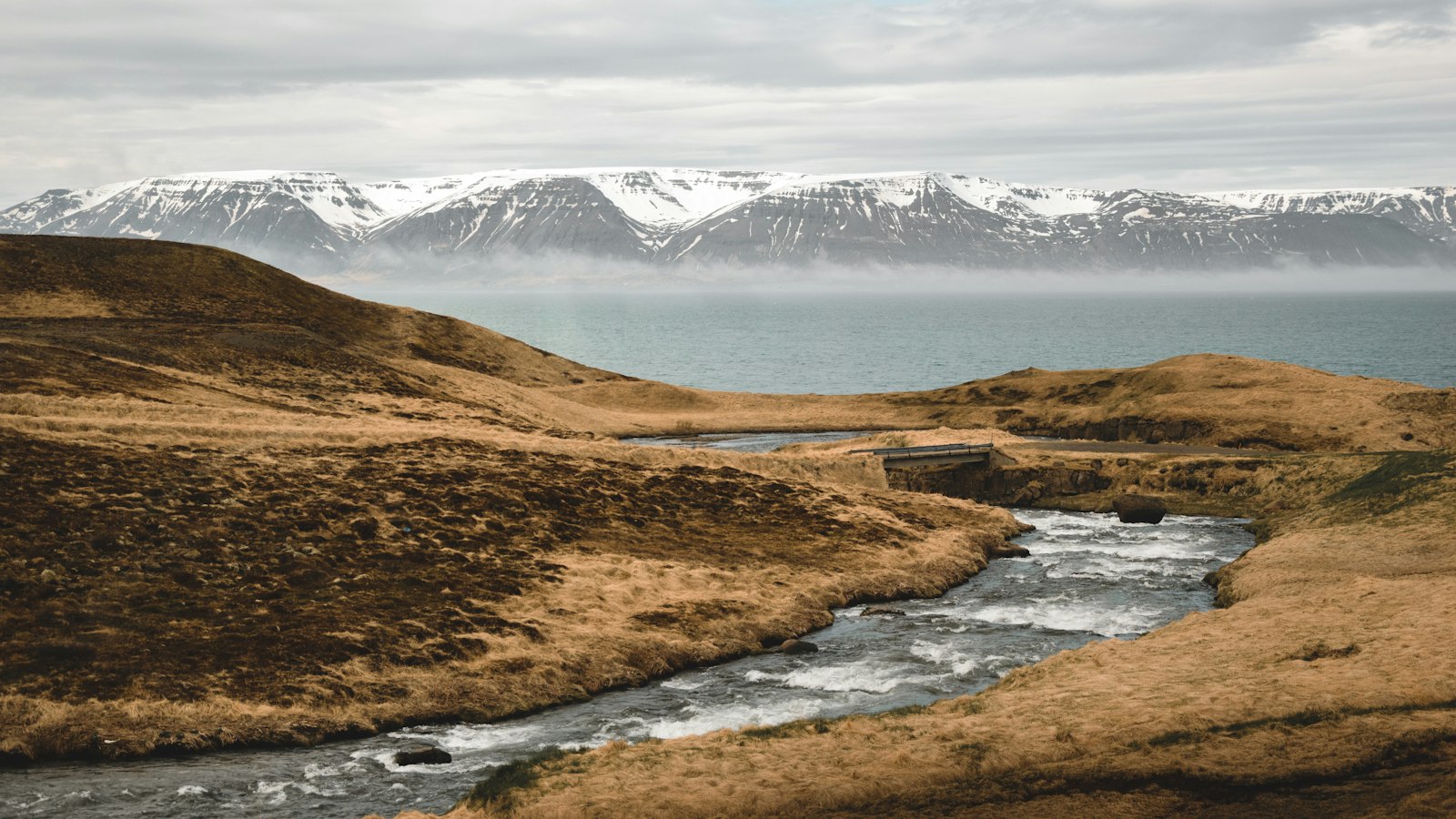 Stream through a grassy valley