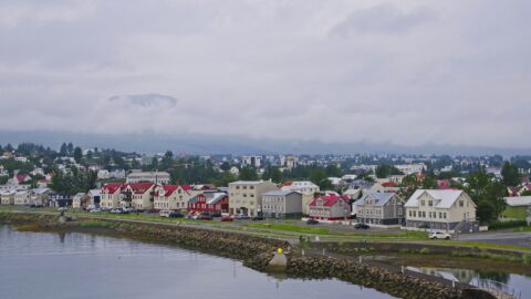 Akureyri town and waterfront under a grey sky