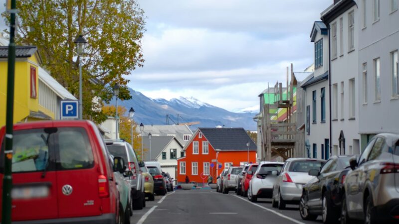 Colourful houses and parked cars on a Reykjavík street